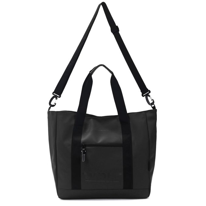 Bolso matero en tela impermeable. Manijas y cinta bandolera.Portanotebook interno. Tela impermeable