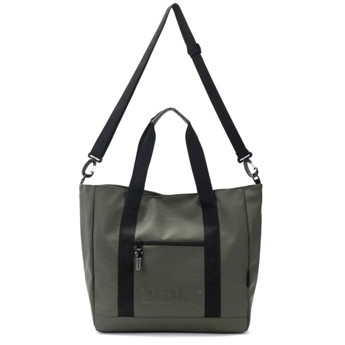 Bolso matero en tela impermeable. Manijas y cinta bandolera.Portanotebook interno. Tela impermeable