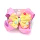 Gomita infantil moño combinacion con pompones; x1u
